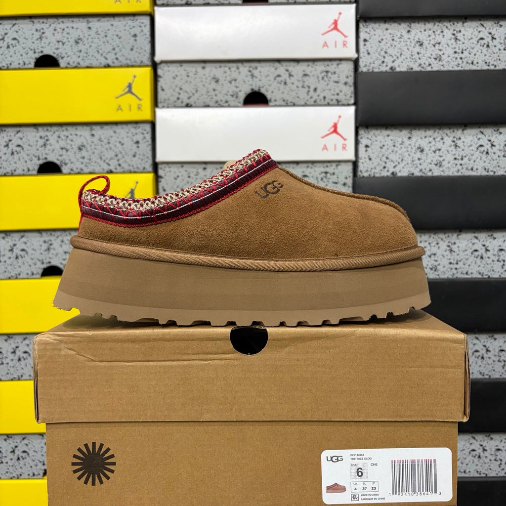 UGG Tazz Platform Slipper – Suede Mule with Shearling Lining, Red & Gold Braided Collar Trim, Red Pull Tab & Chunky Platform Sole in Chestnut