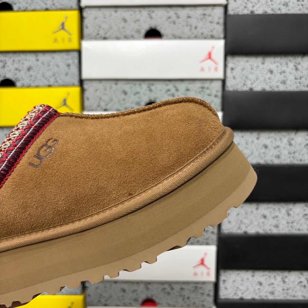 UGG Tazz Platform Slipper – Suede Mule with Shearling Lining, Red & Gold Braided Collar Trim, Red Pull Tab & Chunky Platform Sole in Chestnut